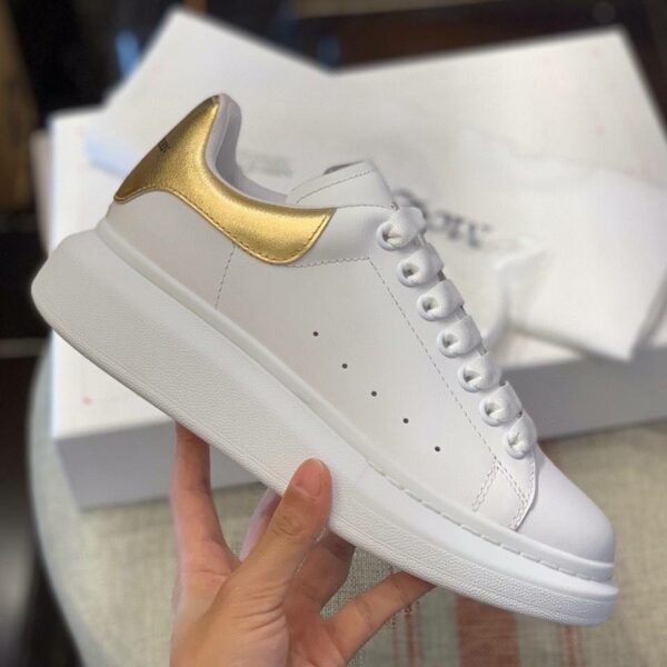 Alexander McQueen MQ Gold cowhide tail Sneakers